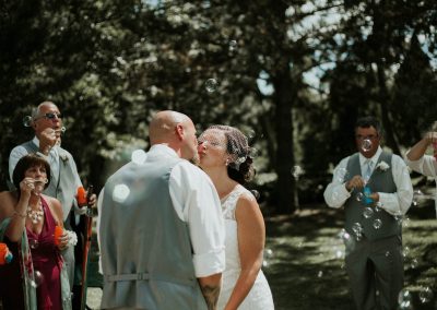 bride and groom kissing after i do como park