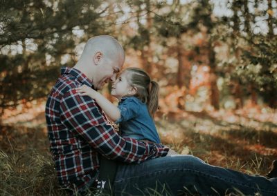 daddy gives daughter butterfly kisses