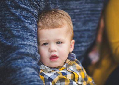 little boy doesn't want to crack a smile