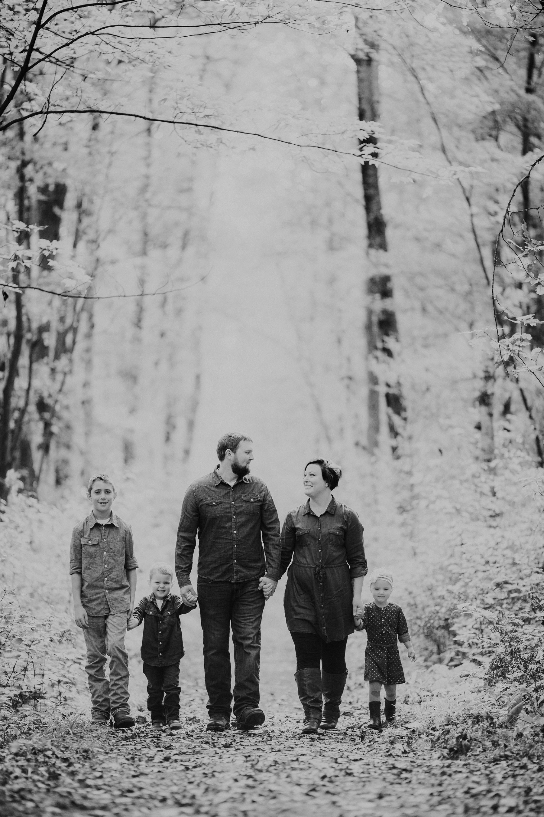 family plays together by river at banning state park